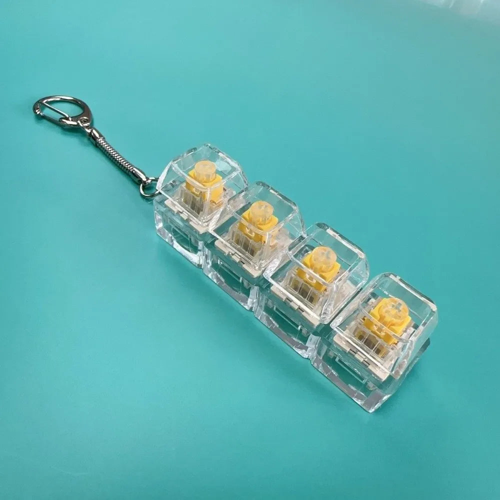 Llavero Fidget con 4 Teclas y Luz - Juguete Antiestres Relajante Adultos - zyntrixe
